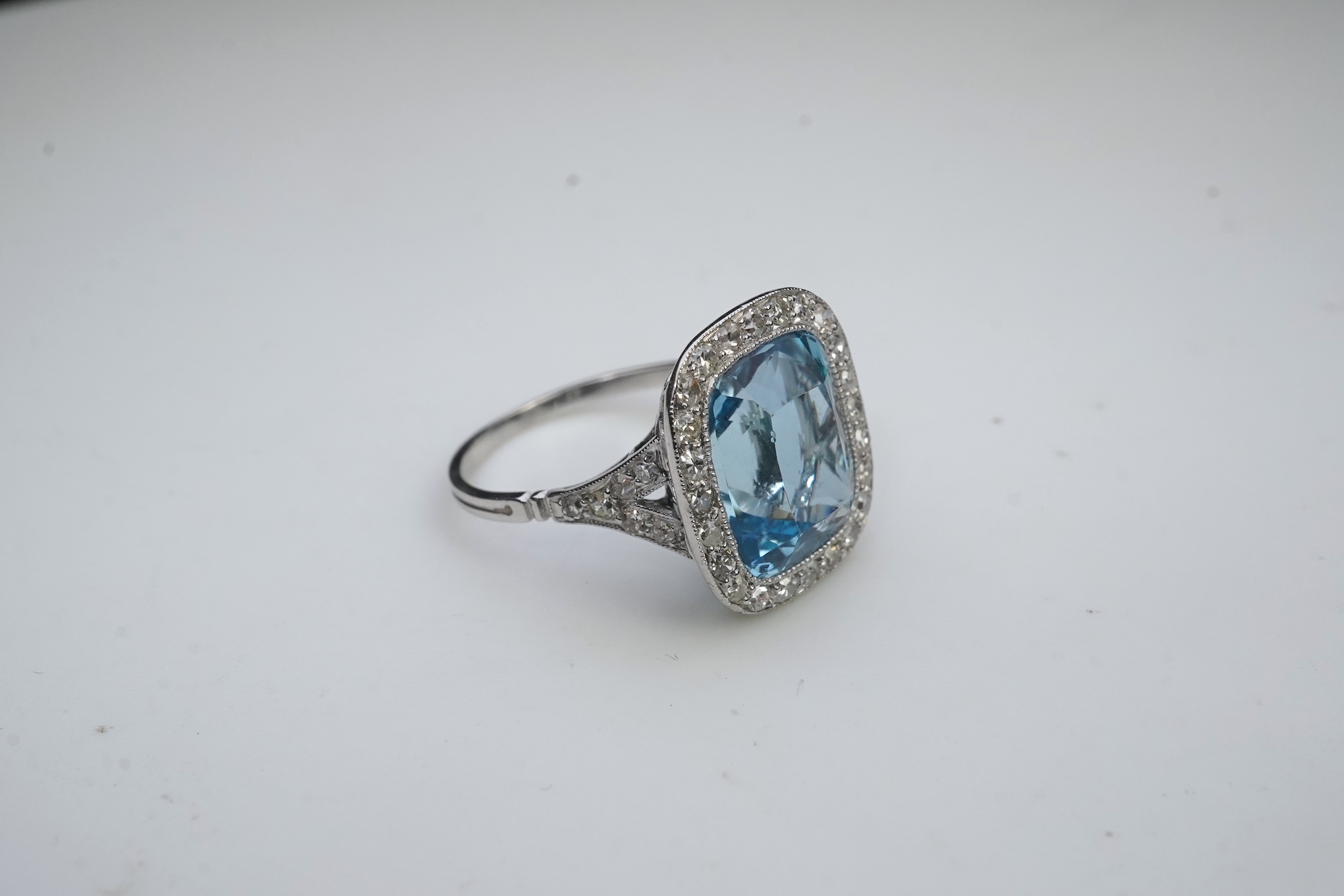 An attractive aquamarine and diamond ring